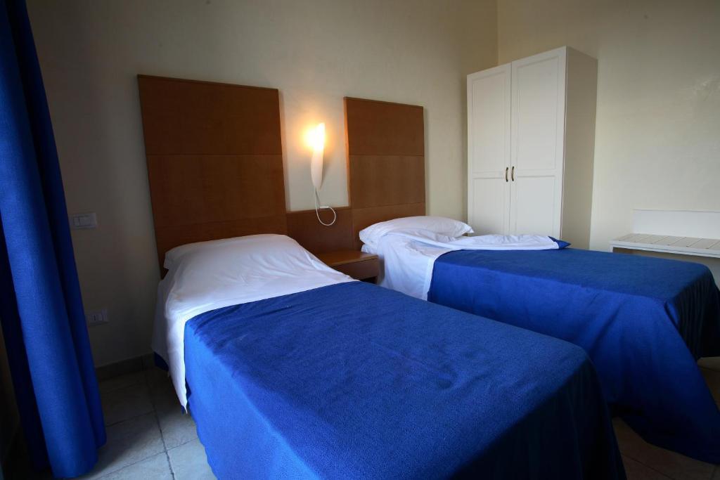 Hotel Resort Portoselvaggio Sant Isidoro  Quarto foto